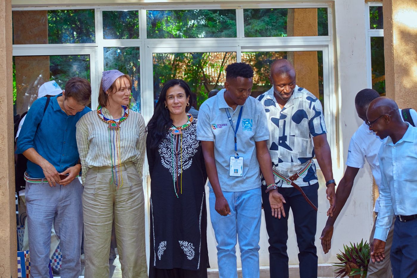 Partners and IPDR staff at a community event