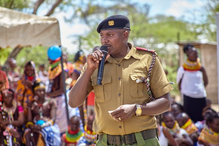 A local administration officer addressing the gathering